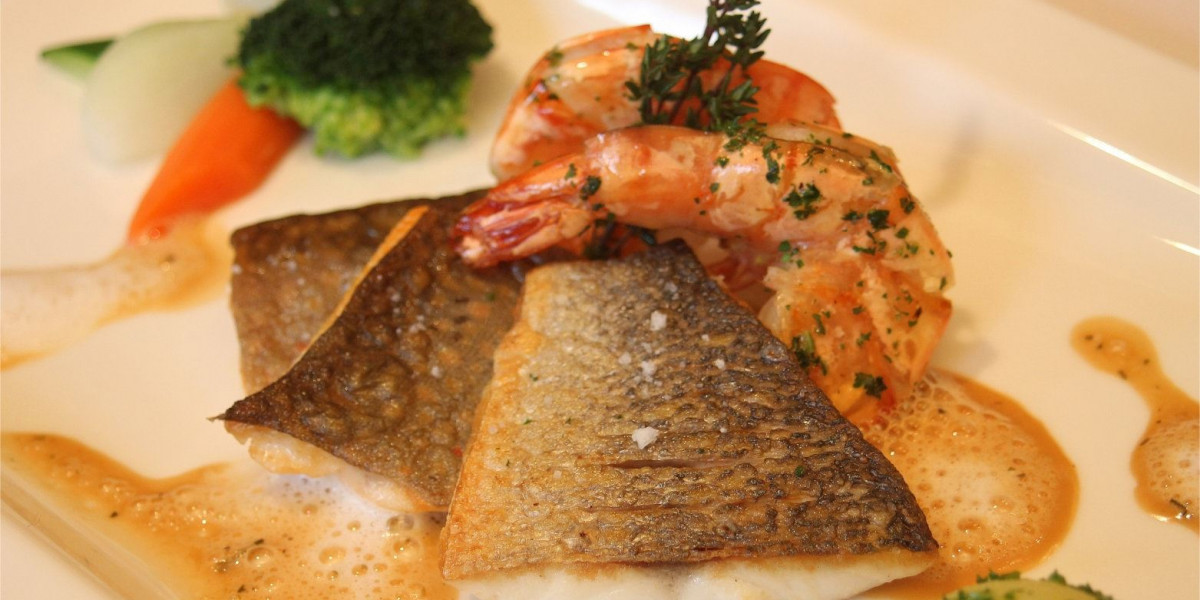 Wolfsbarsch und Garnele mit Kartoffeln